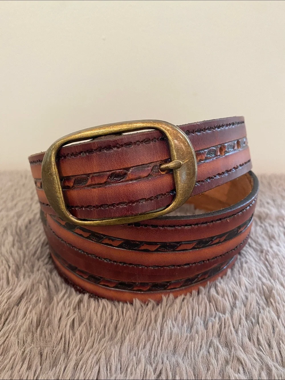 Vintage brown tooled leather belt 47” long 1.5” wide brass